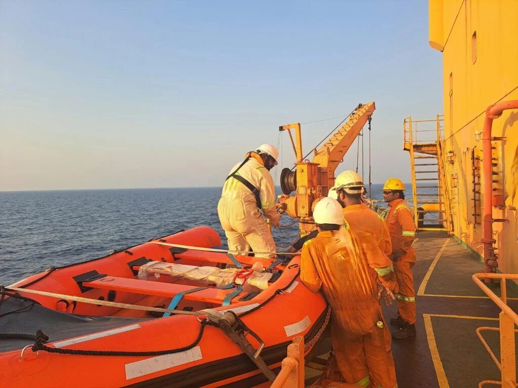 Maritime workers on a vessel